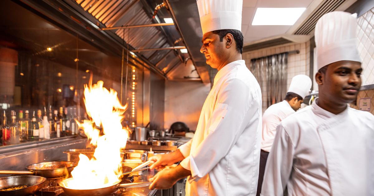 Chefs working in a busy kitchen